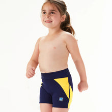 Load image into Gallery viewer, Child wearing navy and yellow swim shorts on a white background