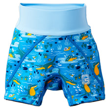 Load image into Gallery viewer, Blue swim shorts with crocodile pattern on a white background