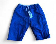 Load image into Gallery viewer, Blue Pjama shorts with a tag on a white background
